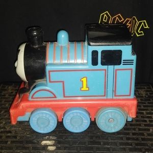 Thomas the train uses 4 AA batteries. Train lights up and makes train sounds. 6"